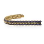 A SAPPHIRE BRACELET, BY ILLARIO, CIRCA 1955 The supple and articulated bracelet composed of two rows