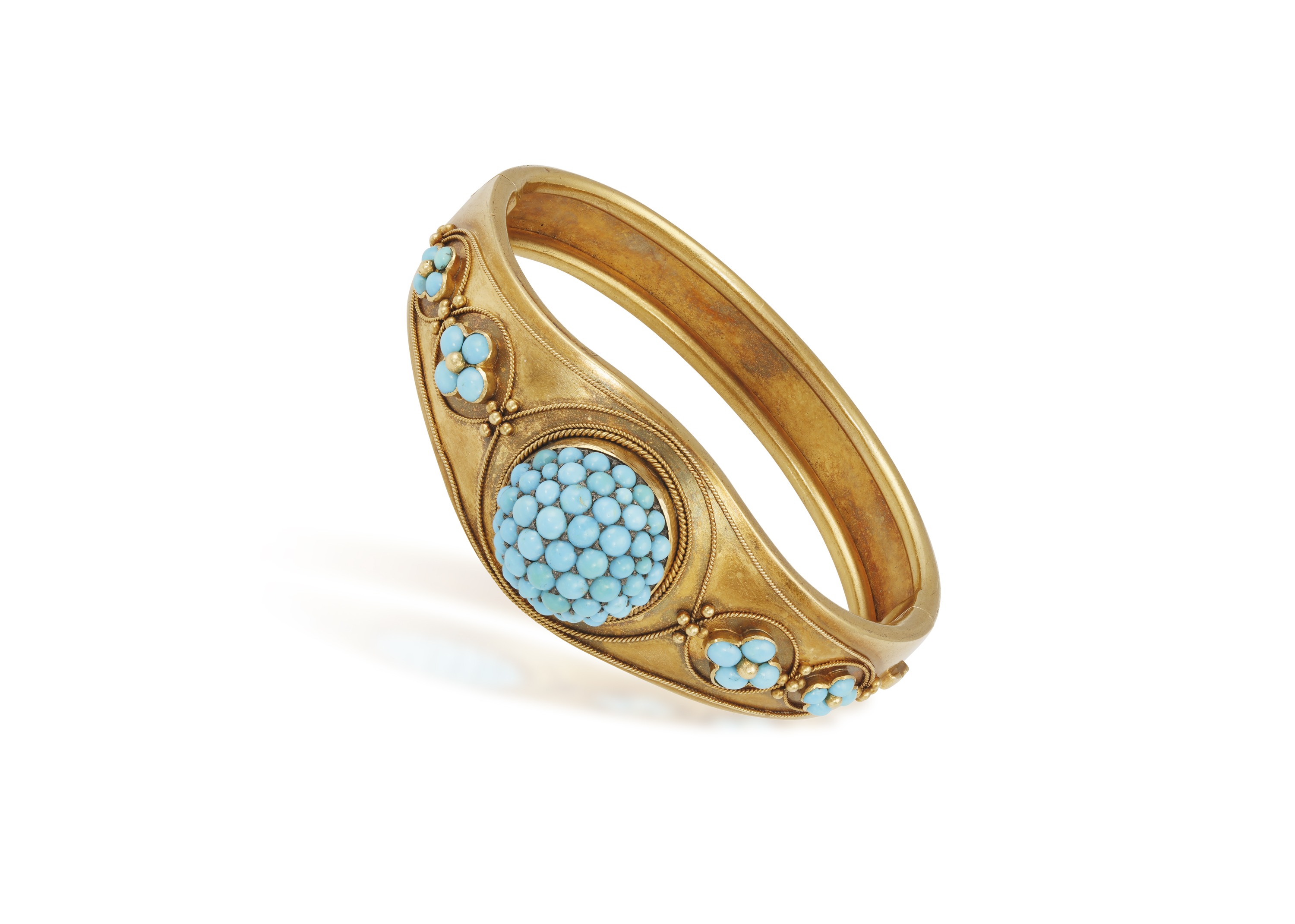 A VICTORIAN TURQUOISE BANGLE, CIRCA 1860 The hinged bangle set with a domed cluster of cabochon - Image 2 of 3