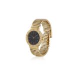 A LADY'S 18K BI-COLOURED GOLD TUBOGAS CUFF WATCH 8-jewel quartz movement, the black dial with