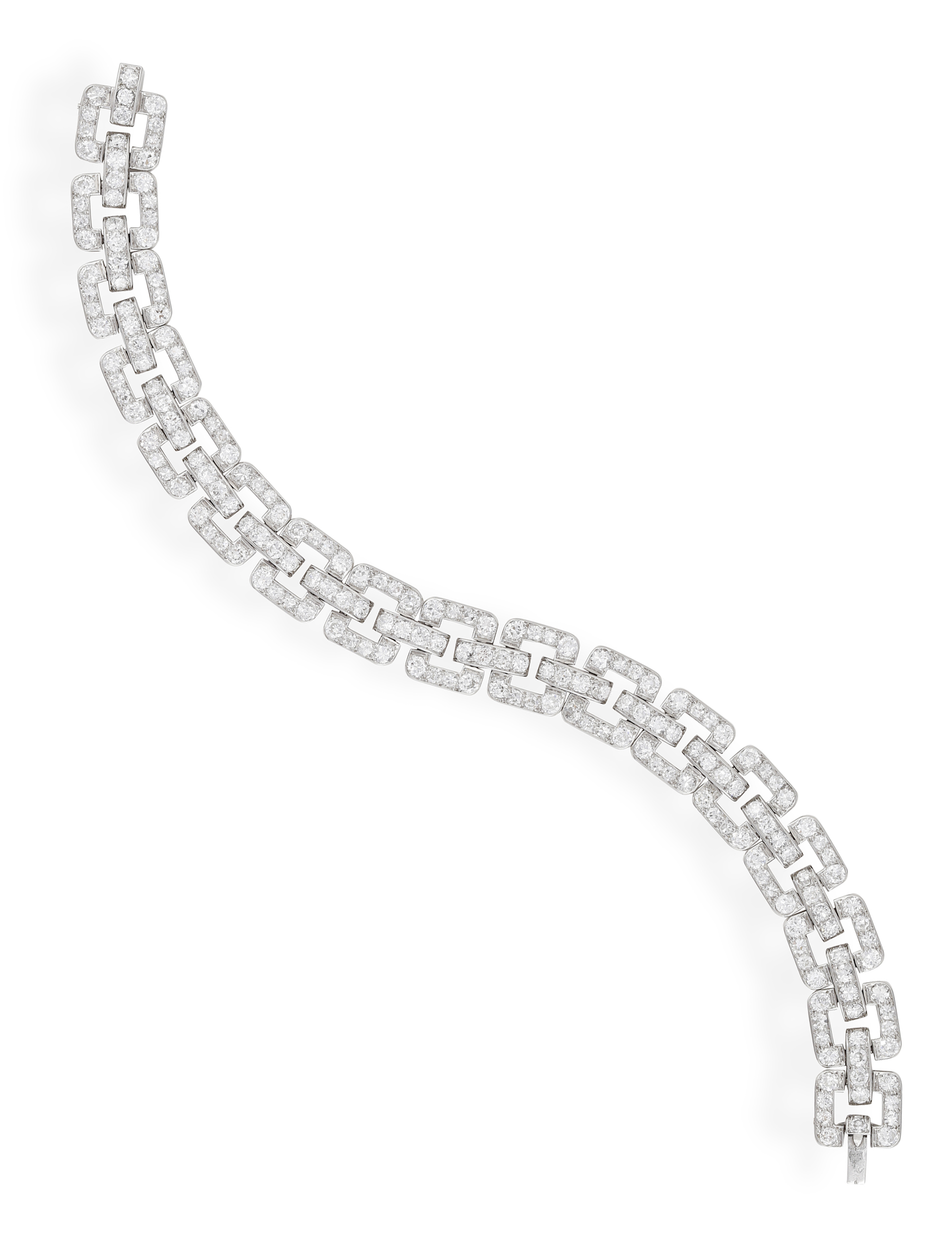 A FINE DIAMOND BRACELET, CIRCA 1925 The articulated bracelet formed of geometric openwork links