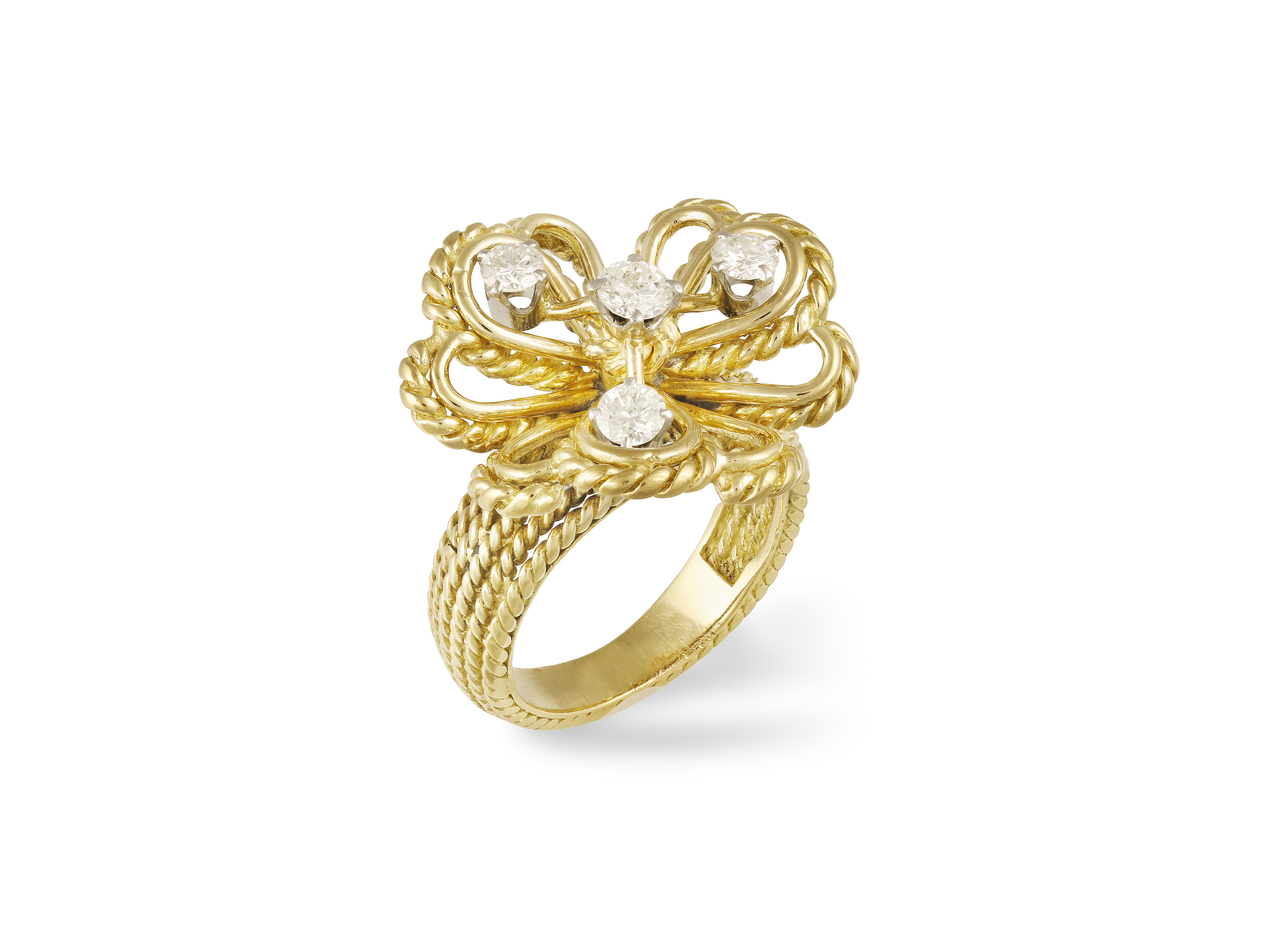 A DIAMOND FLOWER RING, CIRCA 1965 Designed as a flowerhead within ropetwist detail throughout,