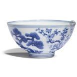 CHINE - Époque GUANGXU (1875 - 1908) Bol en porcelaine décorée en bleu sous couverte des trois