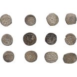 12 monnaies ottomanes en argent. Illisibles. État moyen, rognées.