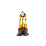 SILVERPLATED TANTALUS & AMBER GLASS DECANTER SET