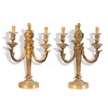 Pareja de candelabros de cuatro brazos de luz de bronce dorado. Trabajo francés, S. XIX