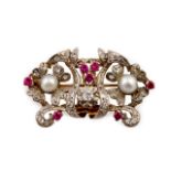 Broche años 30 con perlas, zafiros blancos y rubíes sintéticos con diseño de formas vegetales