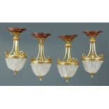 Pareja de lámparas de estilo Luis XVI, de metal dorado y cristal, trabajo español, pp. del S. XX.