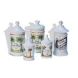 Conjunto de cinco botes de farmacia de porcelana esmaltada. S. XIX