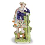 “Escocés”.Figura de loza esmaltada.Staffordshire, Inglaterra, S. XIX.