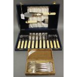 Six pairs of fish eaters & servers, with a pair of carvers in fitted case; & a set of six French