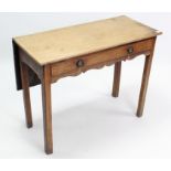 A 19th century mahogany drop-leaf side table, fitted frieze drawer, & on square chamfered legs, 35¾”