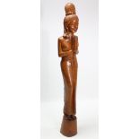 A large carved hardwood Thai female figure, 65¼” high.