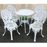 A Victorian-style white painted aluminium patio table with pierced circular top, & on three shaped