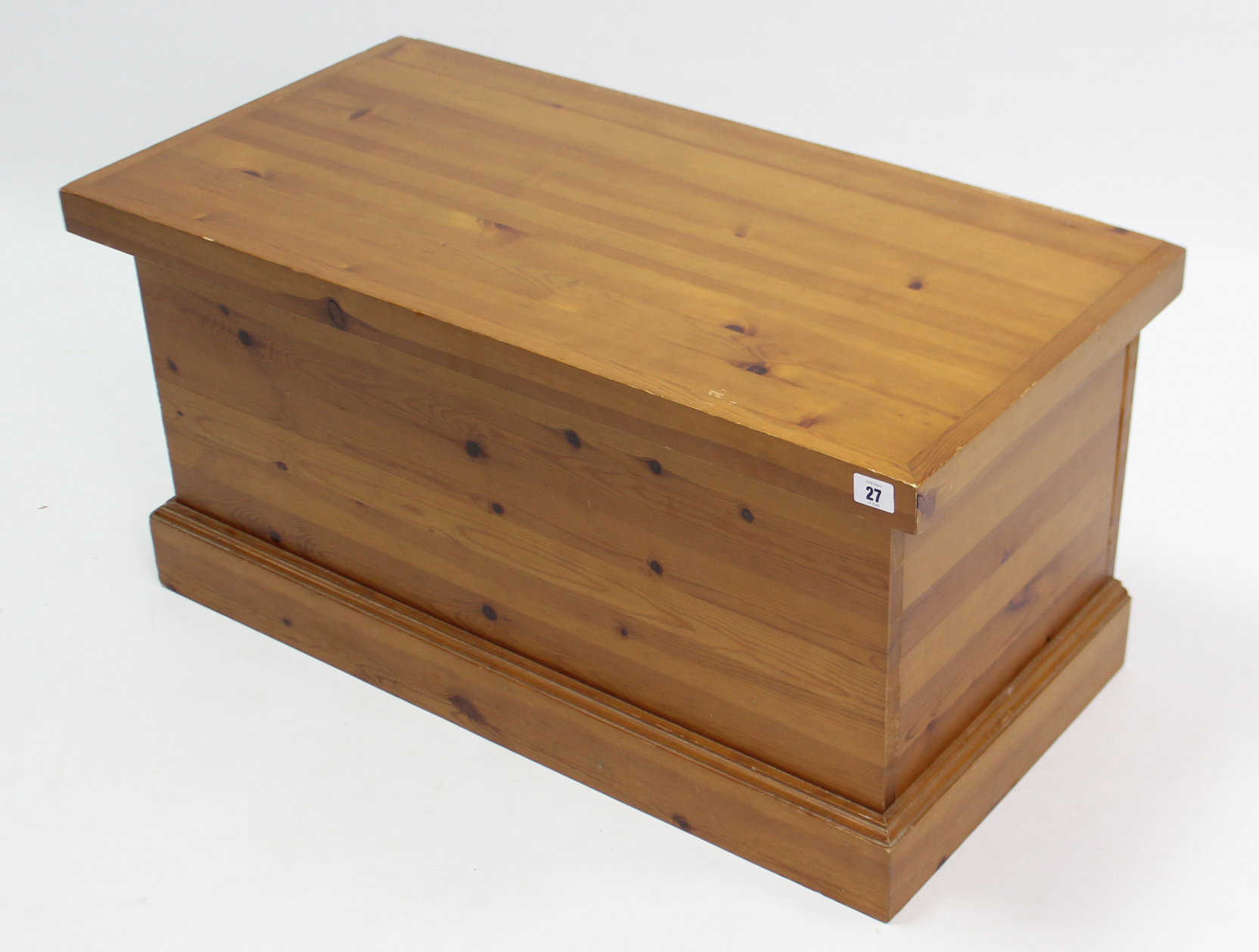 A pine blanket box with hinged lift-lid, & on plinth base, 32¾” wide x 16¼” high.