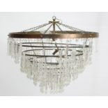 A ceiling light fitting of six concentric tiers & hung with prism drops, 24” diam.; together with