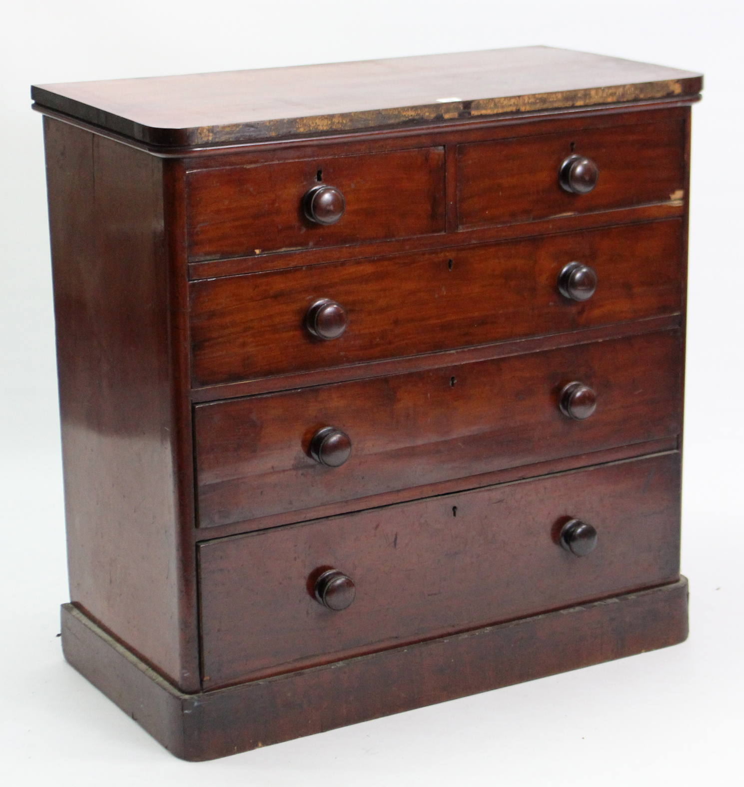 A Victorian mahogany small chest, fitted two short & three long graduated drawers with turned knob