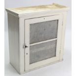A late 19th/early 20th century white painted pine meat safe enclosed by mesh-fronted door, 29½” wide