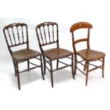A pair of late 19th/early 20th century occasional chairs, & a similar chair.