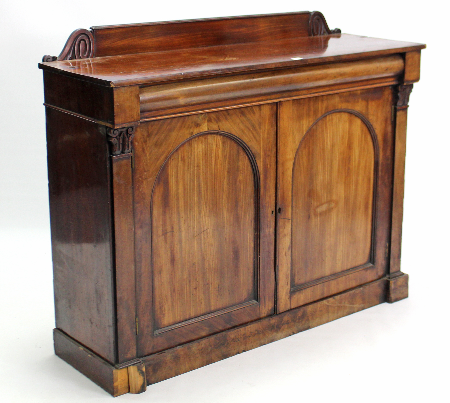 A Victorian mahogany chiffonier (lacking shelf to top), fitted cushion-fronted frieze drawer above