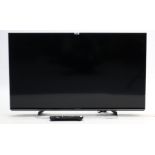 A Panasonic 39” LED television with remote control.