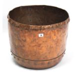 A late 19th/early 20th century copper riveted log bucket, 18½” diam. x 14¾” high.