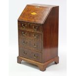 A reproduction inlaid bird’s-eye maple small bureau, with fitted interior enclosed by fall-front