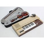 A Bontempi “5” electric chord organ; & a modern child’s violin & bow, with case.