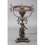 A Victorian cast brass large oil lamp (converted to electricity), with foliate scroll branches &