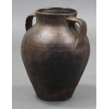 An antique earthenware vase of amphora form, with flat base; 13” high.