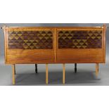 A contemporary satinwood rectangular double headboard inlaid with various exotic woods, made by J.