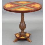 A contemporary pedestal table made by John Sheaff Esq., the circular top veneered in various woods
