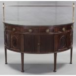 A George III style mahogany demi-lune sideboard by Charles Baker of Bath, with brass rail back &