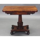 A William IV rosewood card table, the rectangular fold-over top lined with navy blue baize above a