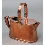An early 20th century copper oblong watering can by Orne Evans & Co., dated 1914.