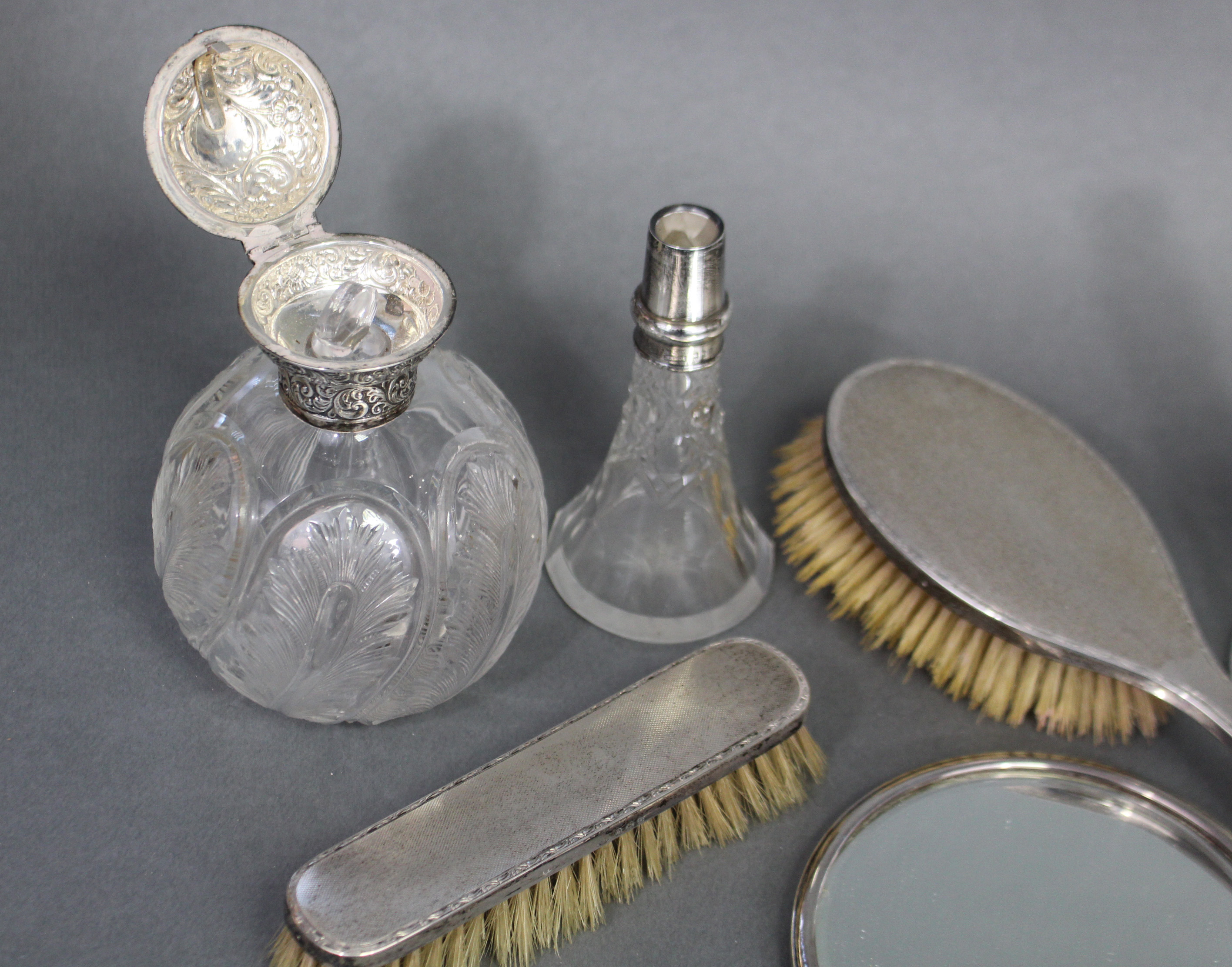 A late Victorian glass spherical toilet-water bottle with finely cut feather motifs, the embossed - Image 4 of 5