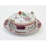 An 18th century Chinese export porcelain circular butter dish & stand, with floral decoration in