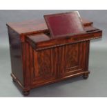 A REGENCY FIGURED MAHOGANY SECRETAIRE, the frieze drawer enclosing a central adjustable writing