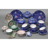 A part-service of Cantonese blue ground dinner & teaware with floral decoration in coloured