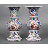 A PAIR OF CHINESE WUCAI PORCELAIN GU-SHAPED VASES, each decorated in underglaze blue & coloured