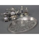 A silver plated engraved oval tray with pierced gallery; a ditto ovoid teapot; ditto similar jug &