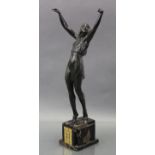 PIERRE Le FAGUAYS (attributed to). A bronze standing figure of a female gymnast, her arms raised