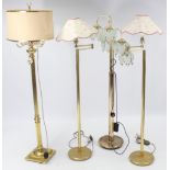 Four modern brass standard lamps.