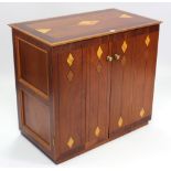 A contemporary inlaid mahogany & avoider veneered side cabinet with fitted interior enclosed by pair