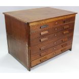 An early 20th century oak plan chest, fitted six long drawers, 47” wide x 33¾” deep x 34” high.