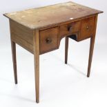 A mahogany small kneehole dressing table, fitted three frieze drawers & on square tapered legs, 33¾”