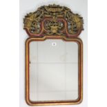 A Chinese-style gilt & crimson composition rectangular wall mirror, 30” x 19”.
