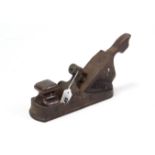 An antique cast-iron, steel, & wooden carpenter’s smoothing plane stamped “Robt. Sorby”, 8” long.