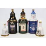 A Bells old Scotch whisky bell-shaped decanter to commemorate the ninetieth birthday of H.M. Queen