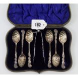 A set of six late Victorian silver teaspoons each with fluted bowl & with fancy terminals; & a ditto