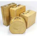 Three early-mid 20th century vellum-covered suitcases, & a ditto hatbox.